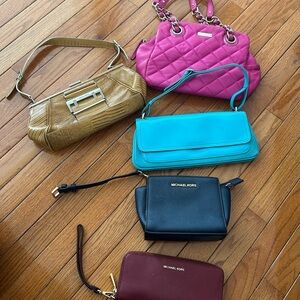 Michael Kors Black Wristlet with Gold Logo and Colorful Assorted Purses